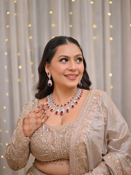 The client's smile says it all. We are so happy to have been a part of her special day, and her radiance makes our outfit sparkle even more.