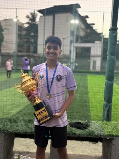 A happy player from our U-15 team with the runner-up trophy.