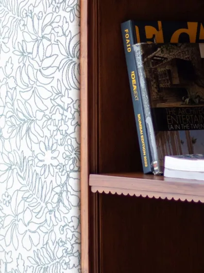 The Aamira storage unit is a piece with details galore. It can function as a bookcase, crockery unit, or bar, and features finger grooves, stained glass, and brass inserts, making it a statement piece for any living or dining area.