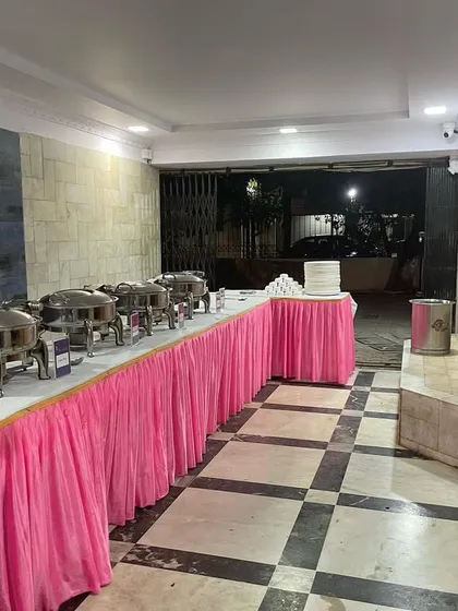 The complete buffet setup for a society event, ready for guests to arrive.