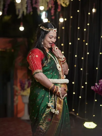 A candid, shy smile from a beautiful mom-to-be at her Dohale Jevan. She is wearing our custom 'tilgul' inspired Sankranti jewellery for her celebration.