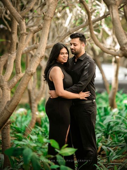 A walk in the woods becomes a romantic escape. I love using the soft, natural light filtering through the trees to create serene and intimate couple portraits.
