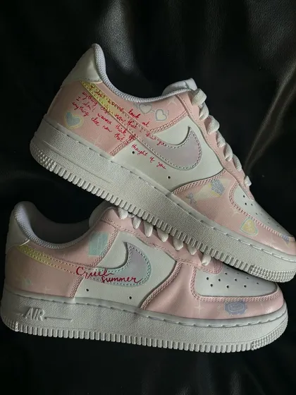 A top-down view of the "Lover" themed Taylor Swift custom sneakers.