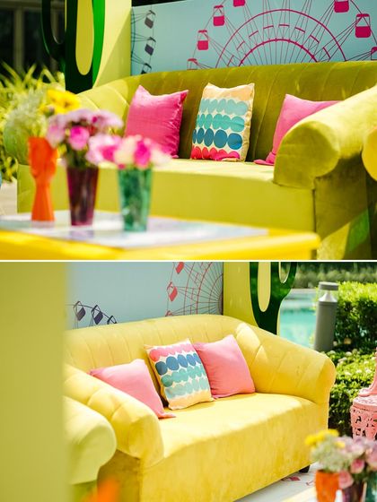 Close-ups of the plush yellow sofa and colorful cushions in the Coachella lounge area. The backdrop features a custom print of a Ferris wheel, reinforcing the festival theme.