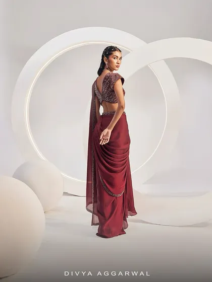 The back view of our IRIE Saree Set, showing the detailed embellishment on the blouse and the elegant drape of the concept saree.