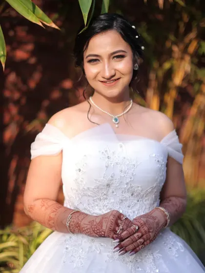 A fairytale moment for a beautiful Christian bride. The makeup for her white wedding was all about soft elegance and timeless grace. I used a delicate touch to enhance her features, creating a fresh, romantic look that complemented her stunning white gown and the outdoor setting.