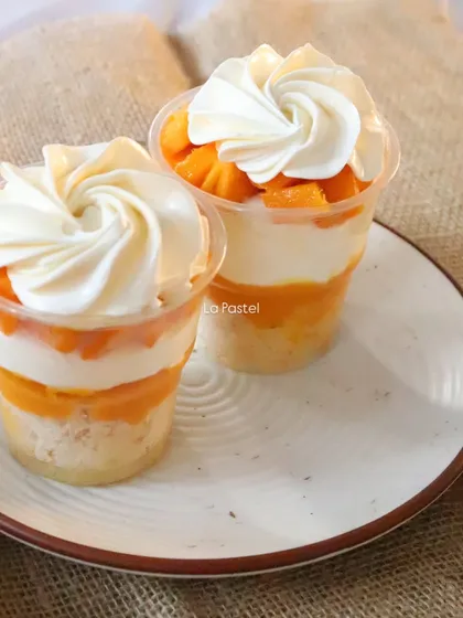 My Mango Sundae Glass, with layers of cake, mango puree, cream, and fresh mango chunks.