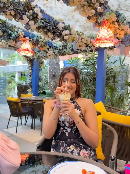 Enjoying my drink and the beautiful ambiance.