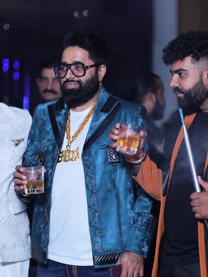 Guests enjoying a drink and the party atmosphere. I capture the social aspect of events, showing people connecting and having a great time.