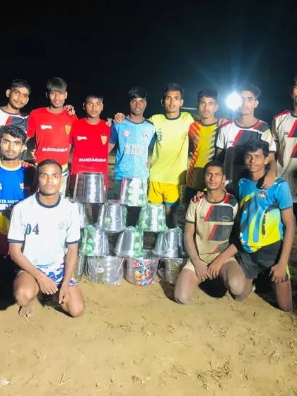 The team posing with their prizes after securing first place in a 'gol' kabaddi tournament.