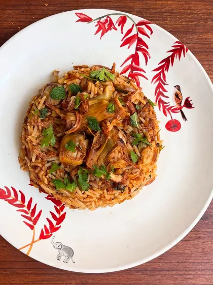 This is our tender Jackfruit Biryani, a seasonal vegetarian star. We cook the raw jackfruit until it's soft enough to soak up all the masalas like a sponge, creating a truly "wow" dish.