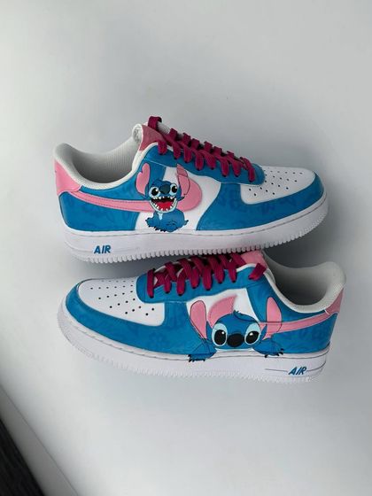 The full pair of Stitch custom sneakers, with different poses on each shoe.