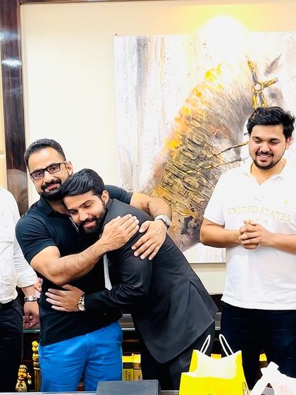 A celebratory hug for a junior who has just become an advocate. Marking these milestones together is part of what makes our team a family.