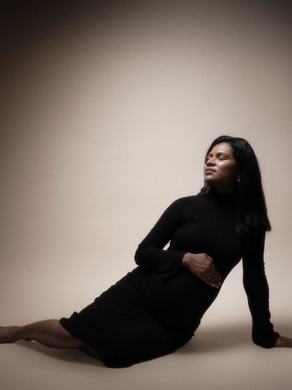 In the quiet of our studio, magic unfolded. This stunning low-light shot is a story of motherhood, grace, and the delicate balance of light and shadows.