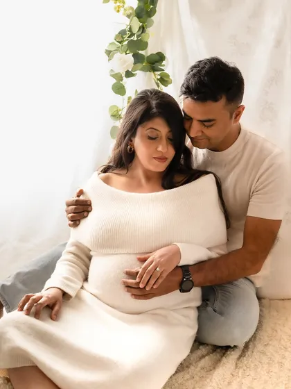 A soft, light-filled portrait that feels so intimate and peaceful. It’s a quiet moment of connection, just the two of them, before three.