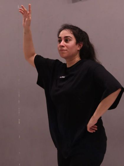A member focused on her Bhangra move. It shows the grace and power that you can learn in our classes, regardless of your starting point.