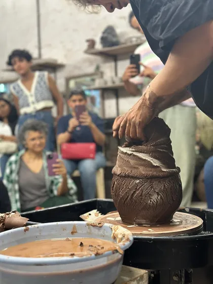Learning is a community affair. Here, visiting Japanese artist Kazuya Ishida demonstrates his unique throwing technique to an engaged group of students. We believe in bringing masters to the studio to share their knowledge and inspire us all.