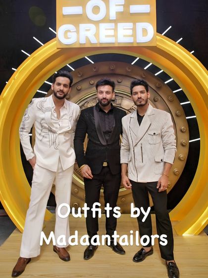The hosts on the set of 'Game of Greed' in their Madaan Tailors outfits. We work closely with clients to create looks that match the event's theme and their personal style.