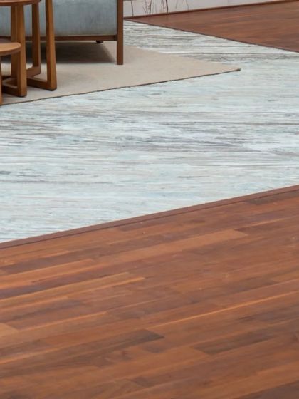 A collection of detail shots from "The White House" project, focusing on material interplay: artistic light fixtures on concrete walls, elegant mirrors, and the transition between wood and patterned flooring.