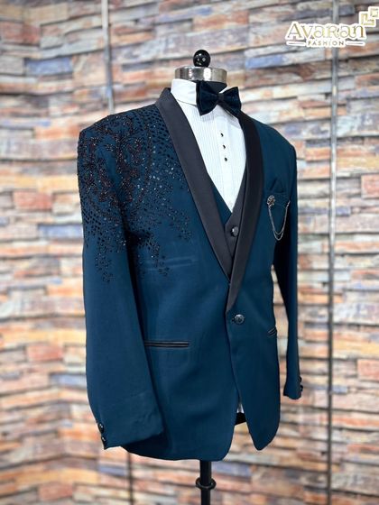 A full shot of the teal blue five-piece suit on a mannequin, demonstrating its structure and complete styling.