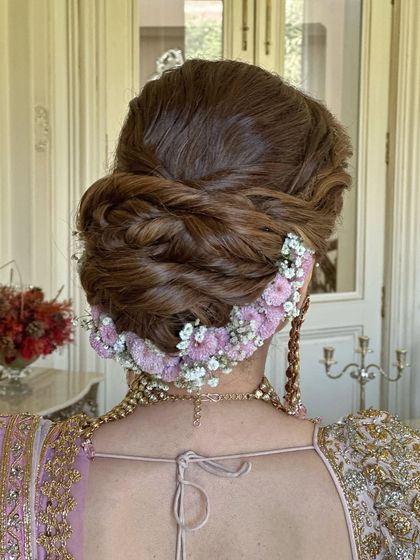 Another clear shot of the back, highlighting the intricate twists and floral arrangement.
