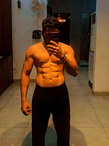 No excuses, just results. A clear shot of a well-defined six-pack, the product of a strict diet and consistent ab training.