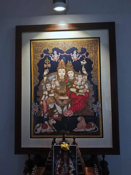 Our Shiva Parvati Kutumba painting adorning a client's pooja room. This art piece, symbolizing familial unity and divine harmony, makes a stunning addition to any sacred space.