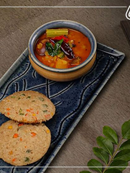 Another look at our wholesome South Indian meal, featuring vegetable-filled idlis and sambar. It’s a perfect example of how we make traditional dishes healthy and delicious.