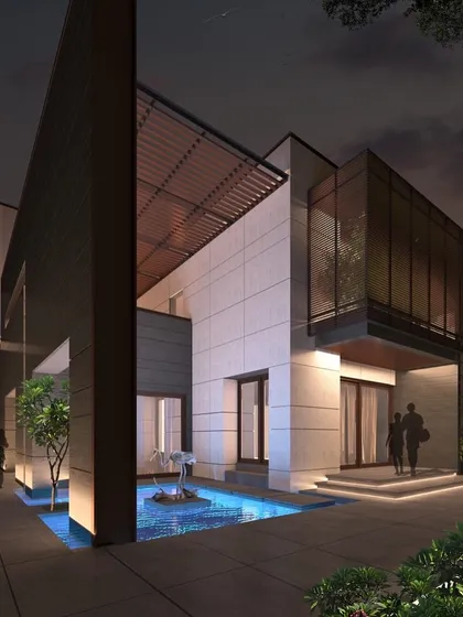 This modern bungalow design moves away from ornamentation to focus on clean, symmetrical lines. The beautiful amalgamation of materials like stone, glass, and water creates a sensory experience and a home that is easy to fall in love with.