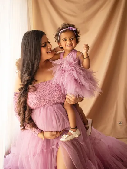 The pure joy of family. I love capturing these beautiful moments between a mother and her child, celebrating the new life that will soon join them.