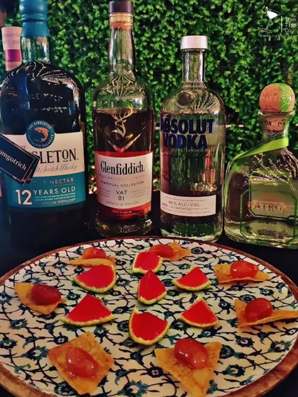 An example of our molecular cocktails. These are edible jellies and spheres that capture the essence of a cocktail in a single bite, served alongside premium spirits like Glenfiddich and Patron.