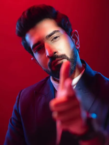 Creating a powerful actor headshot is about capturing personality. For this portrait, I used a combination of red and blue gel lighting to create a moody, cinematic feel that is both confident and engaging.