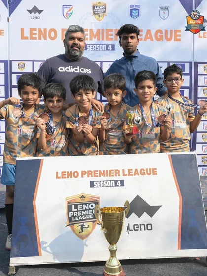 Another shot of our U9 team with their medals and trophy. A proud moment for the players, coaches, and parents.