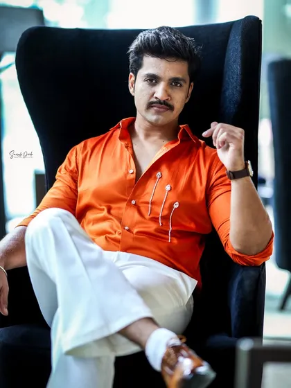 A confident and stylish pose from actor Rohit Parshuram. My grooming service ensures male clients also look their absolute best for any event.