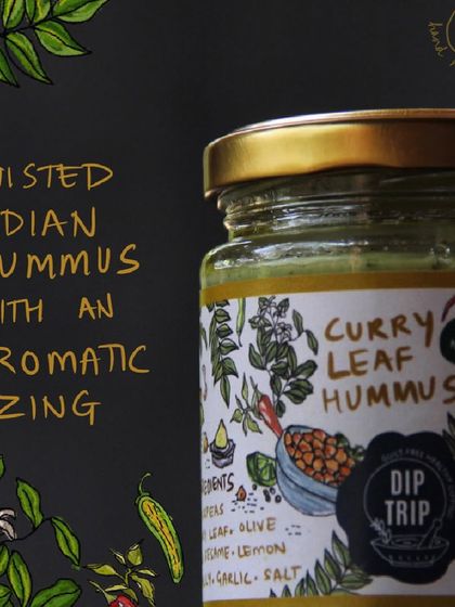 A product shot of my Twisted Indian Hummus jar. The label hints at the aromatic zing of curry leaf inside, a unique fusion that sets my hummus apart.