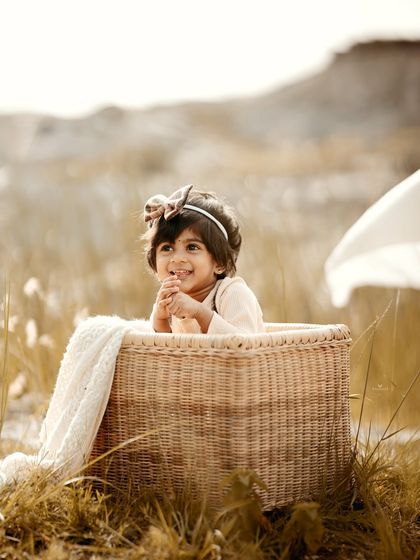 A thoughtful and sweet profile shot, beautifully lit by the natural sunlight.