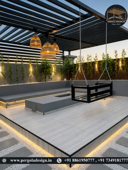 A modern terrace design featuring a sleek, black metal swing suspended from the pergola. The space is beautifully lit with designer pendant lights and integrated LEDs, creating a chic and cozy ambiance.