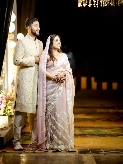 A simple and elegant portrait of the couple at their reception.