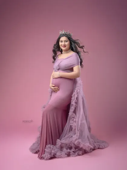 This ruffled lavender gown creates a soft, romantic feel. I use a matching pink backdrop to create a gentle, monochromatic look that is both modern and timeless.
