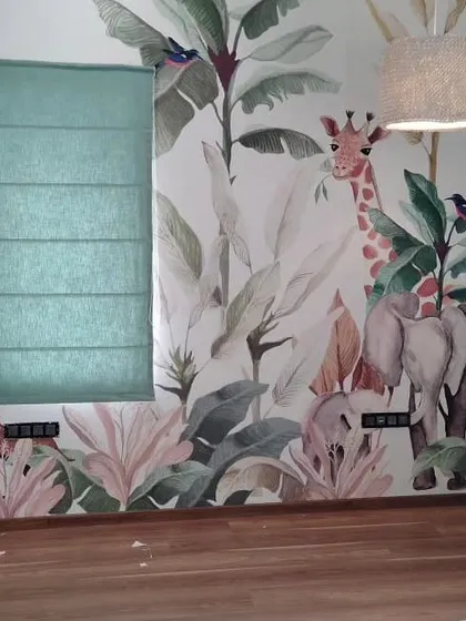 Another look at the jungle-themed kid's room where I installed a fabric Roman blind. My service includes helping you pick a blind style that works with your overall interior design.