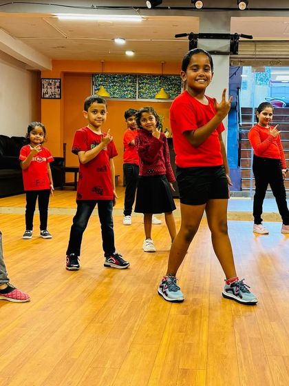 Our little stars striking a pose during a class. We encourage them to be confident and express their personalities through dance.