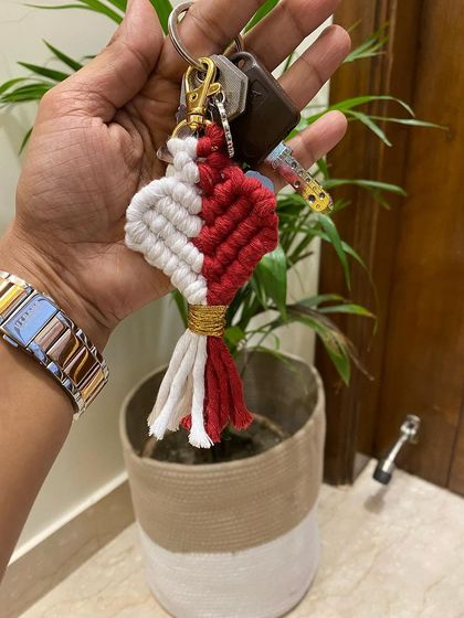 This red and white macrame heart keychain is bold and beautiful. It makes a wonderful and personal handmade gift for someone special.