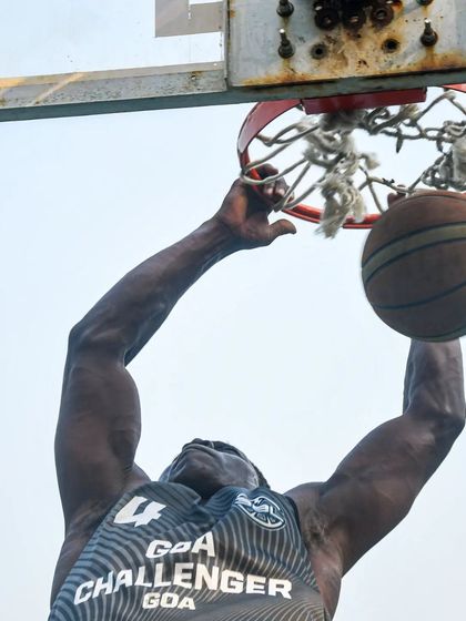 Another angle of a powerful dunk. We build the strength and athleticism to finish above the rim.