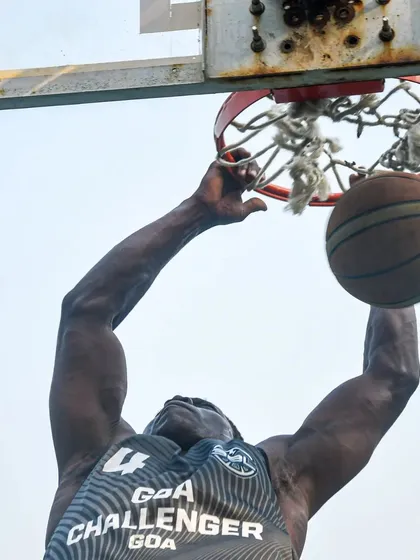 Another angle of a powerful dunk. We build the strength and athleticism to finish above the rim.