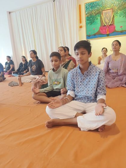 Children and adults meditating together during our Buddha Purnima session. It is beautiful to see families coming together in search of truth.