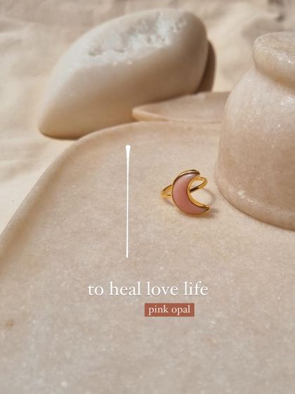 To heal your love life, I often recommend Pink Opal. This is my 'chándra' luna ring in Pink Opal, a stone of happy dreams that I shape to help inspire love and compassion.