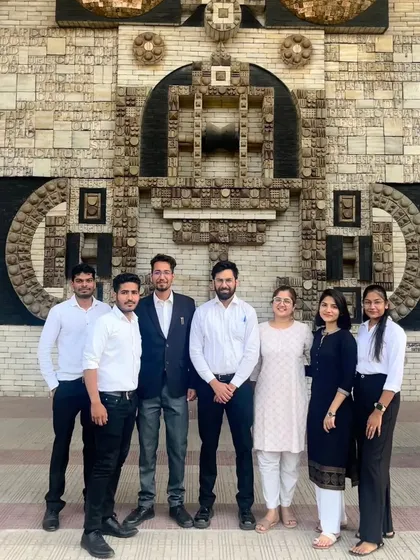 My colleagues and I outside a modern building. As lawyers, we are a part of our clients' most important life and business moments.