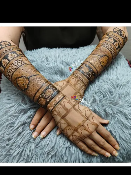 A full view of a beautiful and intricate back-hand design. This shows the level of detail and symmetry I strive for in all my work.