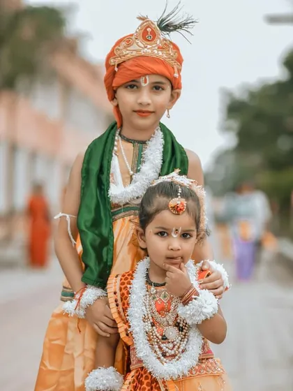 The innocence of childhood captured during a festival. These two children, dressed as Radha and Krishna, represent the purity and joy I look for in family and event photography. This portrait was taken outdoors with a focus on their detailed costumes and expressive faces.