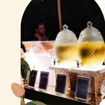 A glimpse of our illuminated water dispensers, which keep our different types of Gol Gappa pani chilled and ready to serve. This setup ensures efficient service while adding a touch of modern elegance to the counter.